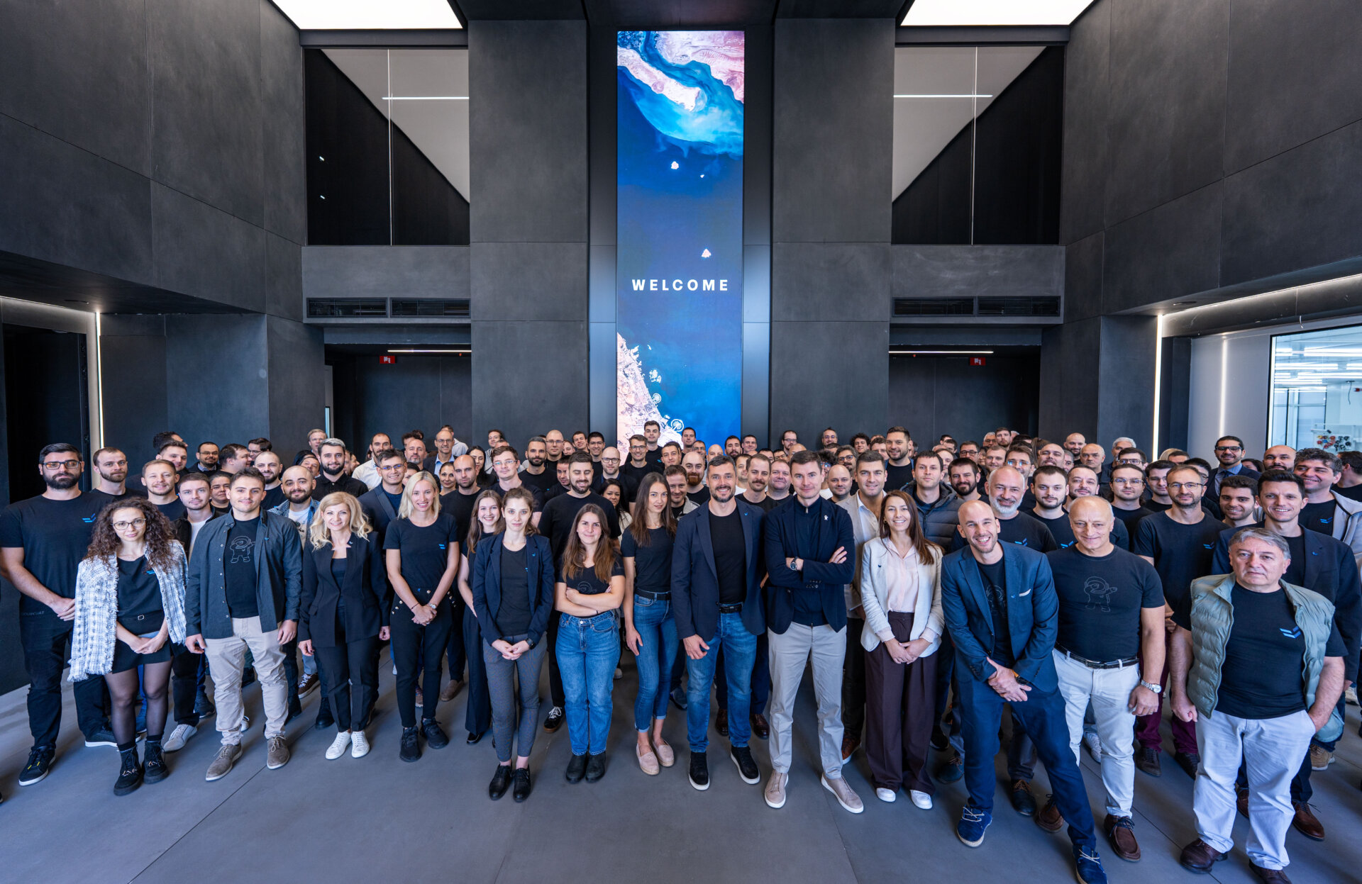 EnduroSat's CEO & Founder Raycho Raychev with the entire team in the lobby of the newly opened Space Center in Sofia
